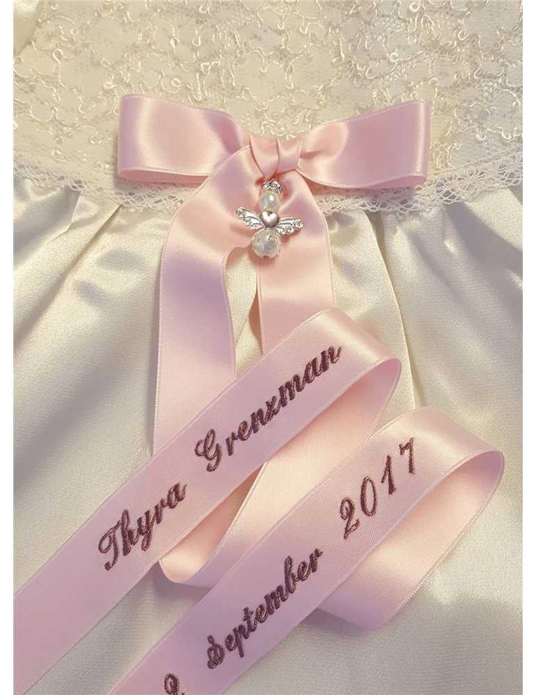 Doprosettsbroderi i ljuva rosa toner