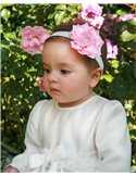 Diadem med rosa blomma på baby flicka