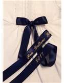 Doprosett med guldbroderi till pojke