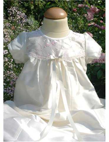 Dopklänning med blombroderi i siden