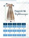 Dopklänning med pärlbroderat sidentyg Dopklänning med pärlbroderat sidentyg